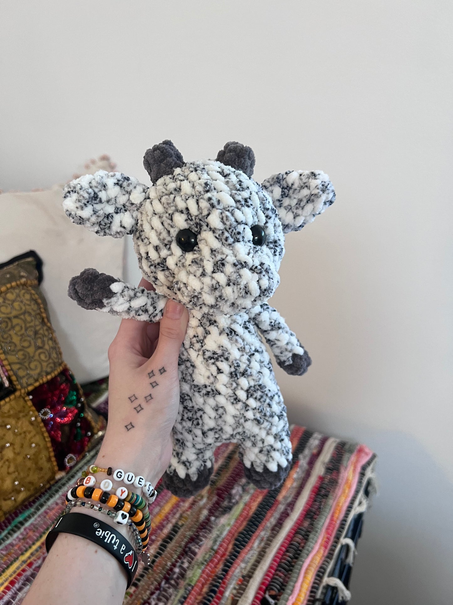 Speckled grey cow plushie