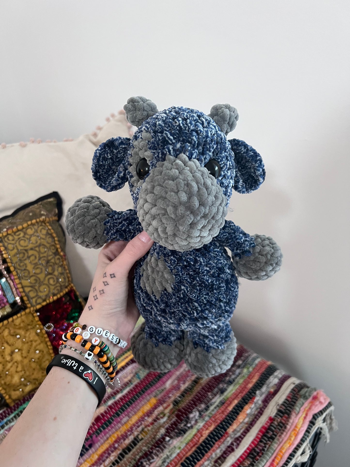 Blue and grey speckled cow plushie