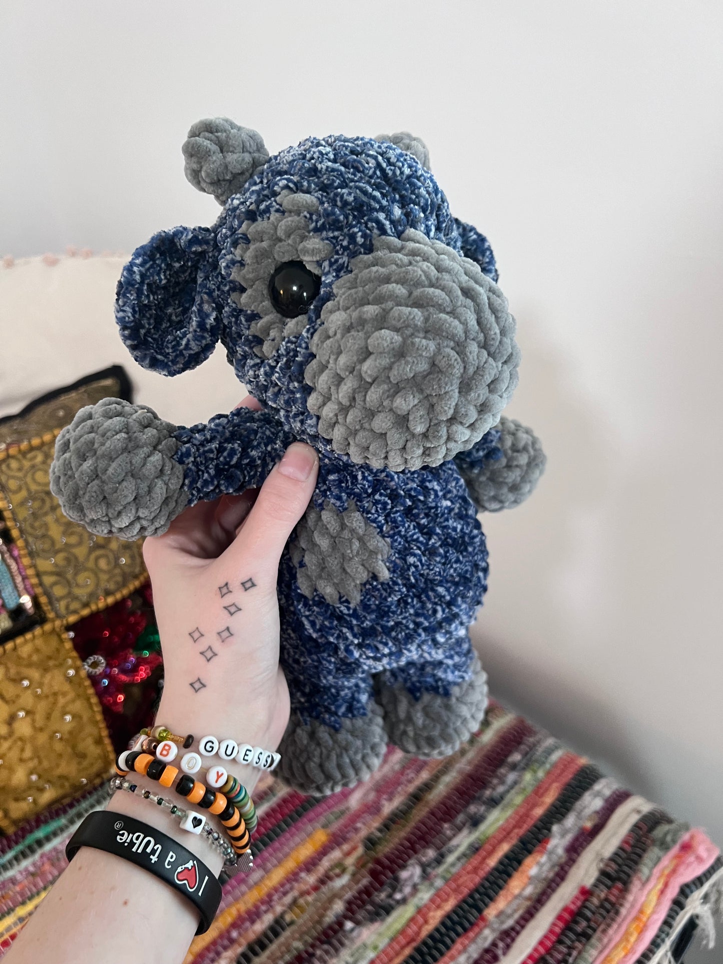 Blue and grey speckled cow plushie