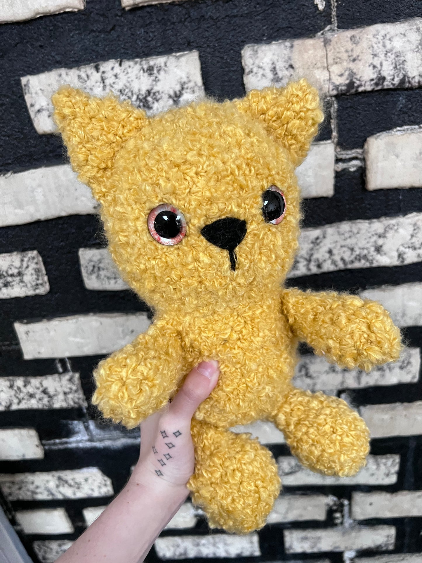 Fluffy orange cat plushie