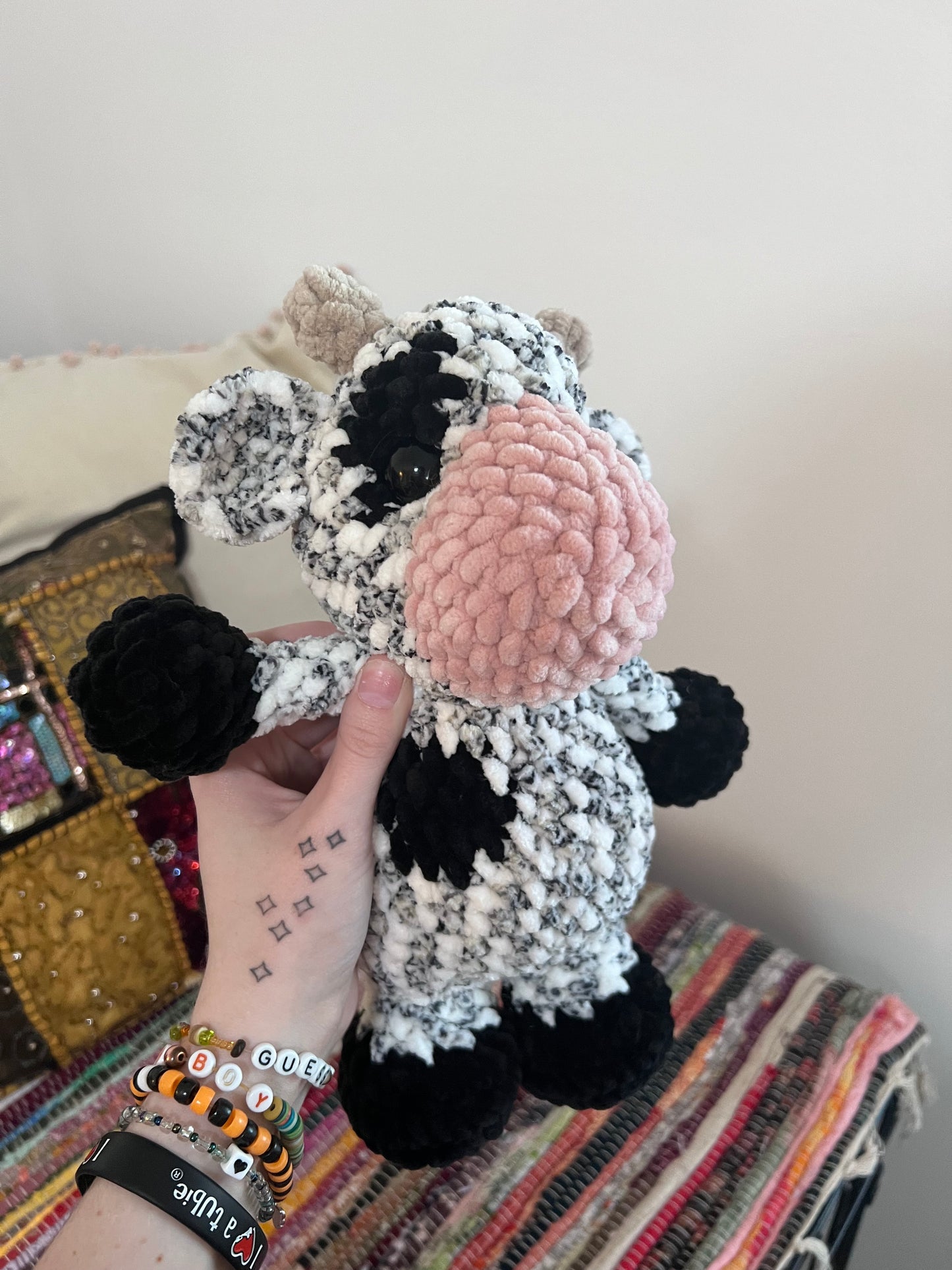 Speckled classic cow plushie