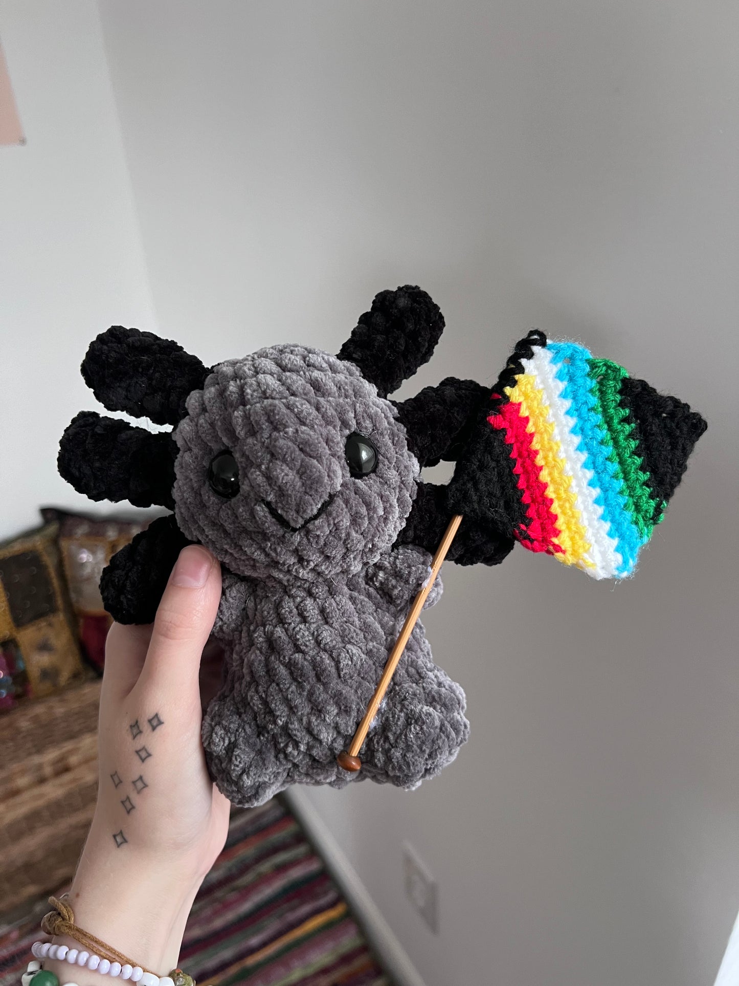 Disability pride axolotl plushie