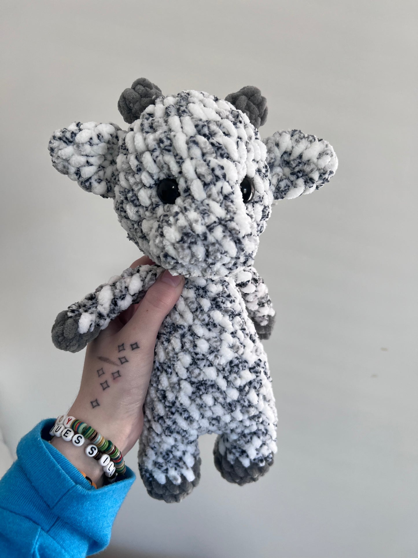 Speckled grey cow plushie